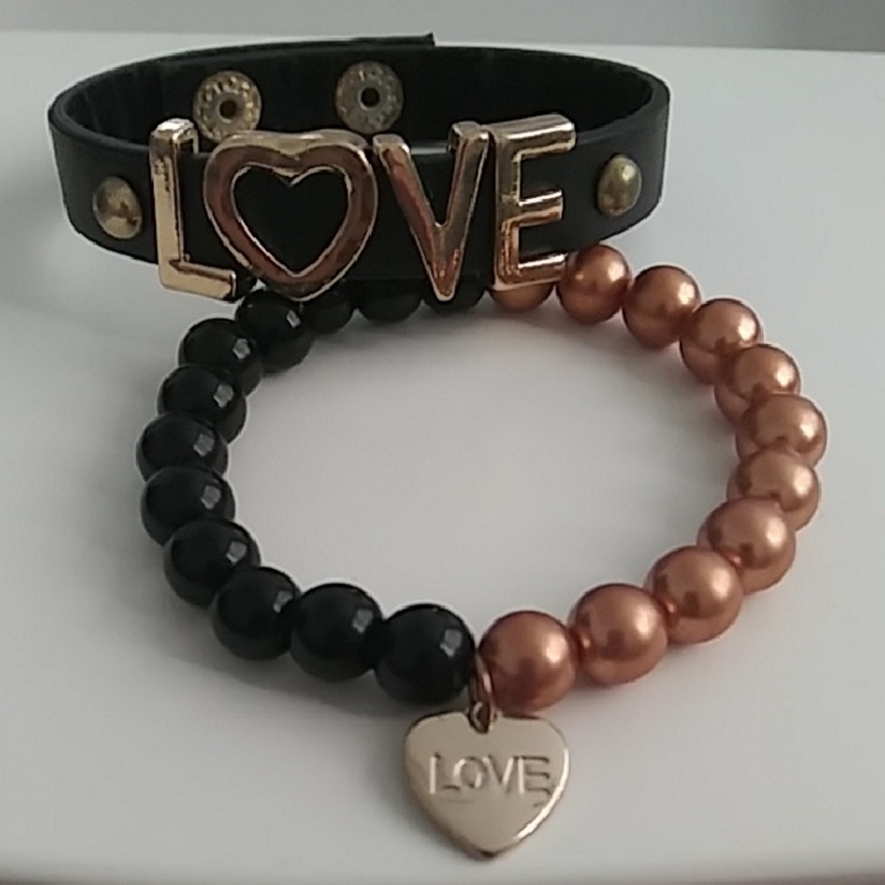 New. Chic Black and Gold 'LOVE' Bracelet Set.